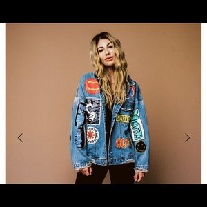 Super cute unique jacket. Lots of fun patches and style. In brand new condition.